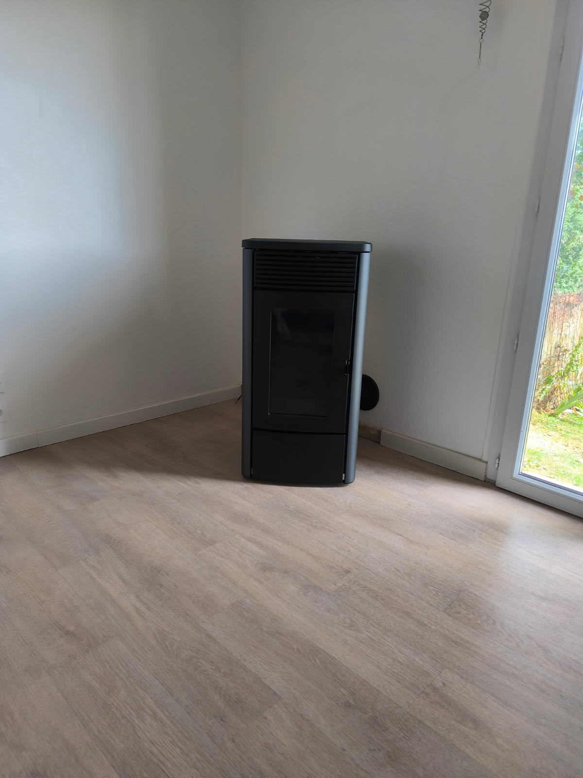 Installation d'un poêle à granulés MCZ chez un client