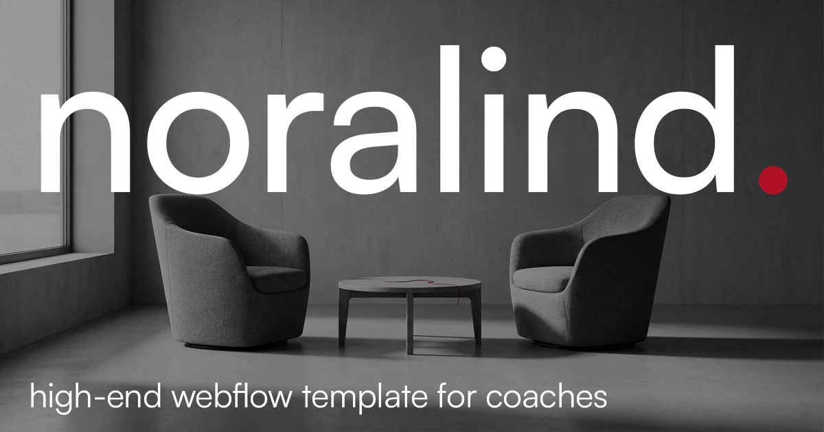 Two modern gray armchairs facing each other with a round table between them in a minimalist room with gray walls and floor, featuring large windows and the text 'noralind.' in large white letters with a red dot, and 'high-end webflow template for coaches' below.