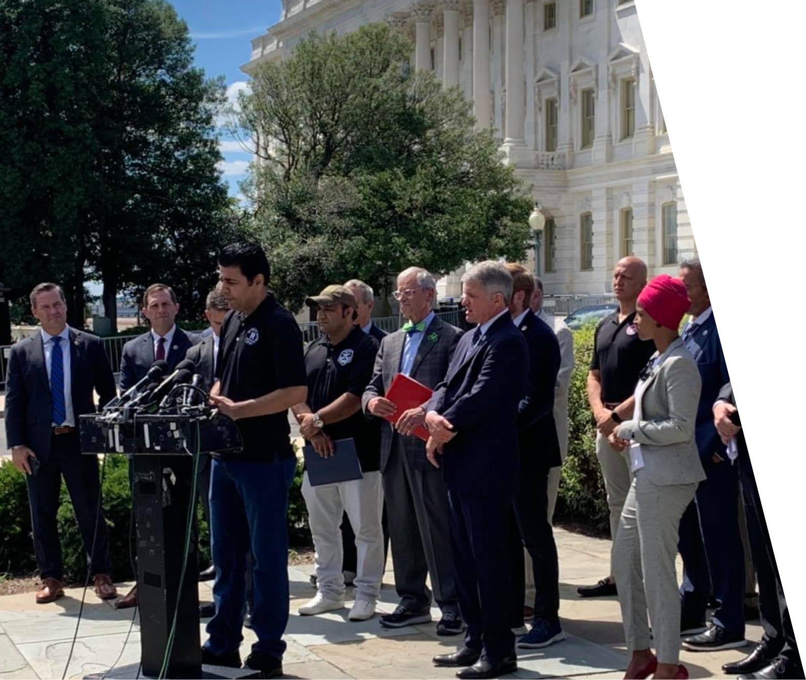 Speakers and supporters at a press conference outside the U.S. Capitol.