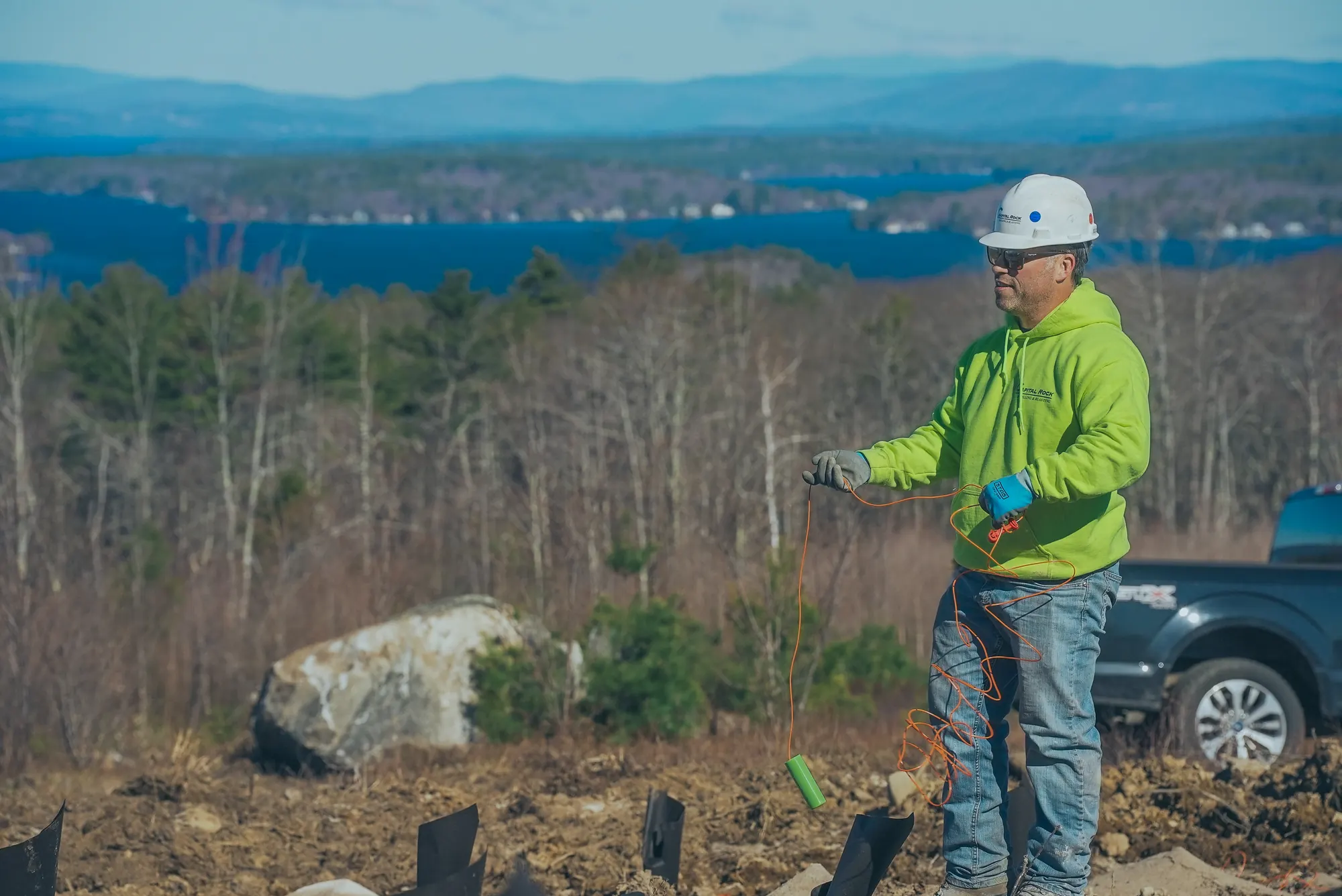 Crew member handling cords during site preparation