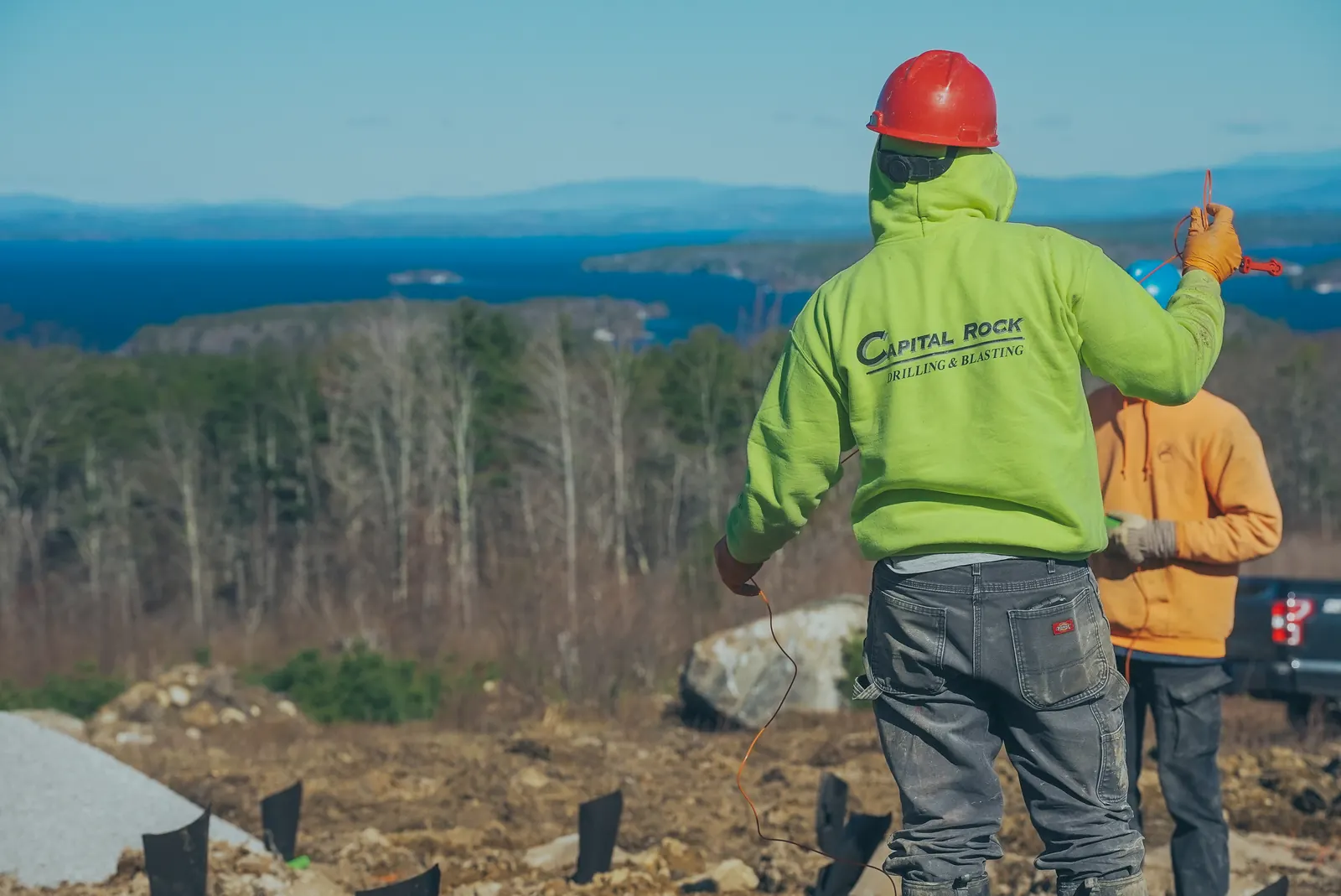 Two crew members coordinating work on site