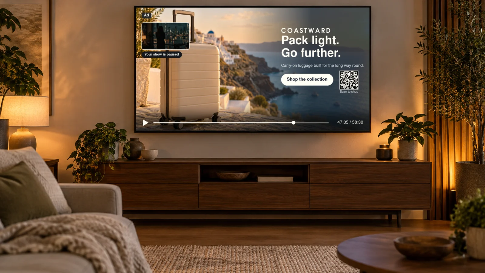 A paused drama replaced by a full-screen luggage ad with a QR code, with a small inset showing the paused show.
