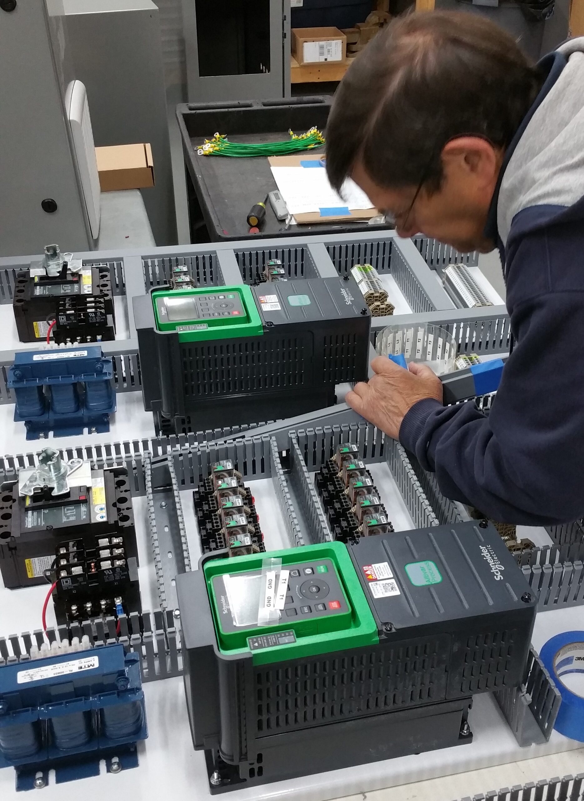 Technician working with control equipment in the field