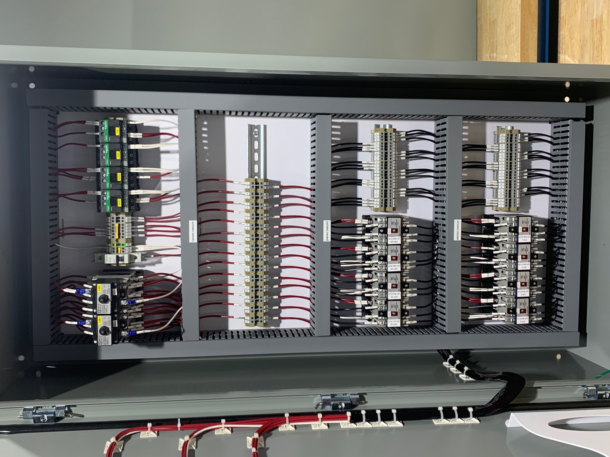 Detailed terminal wiring inside a custom electrical control panel