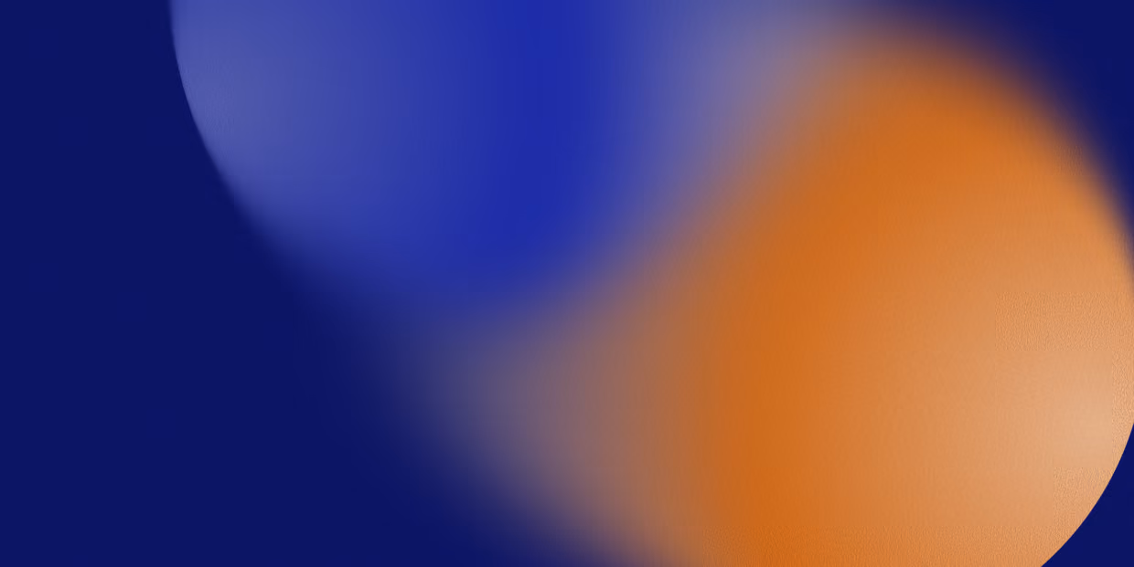 Blurred abstract background with blue and orange circular shapes.