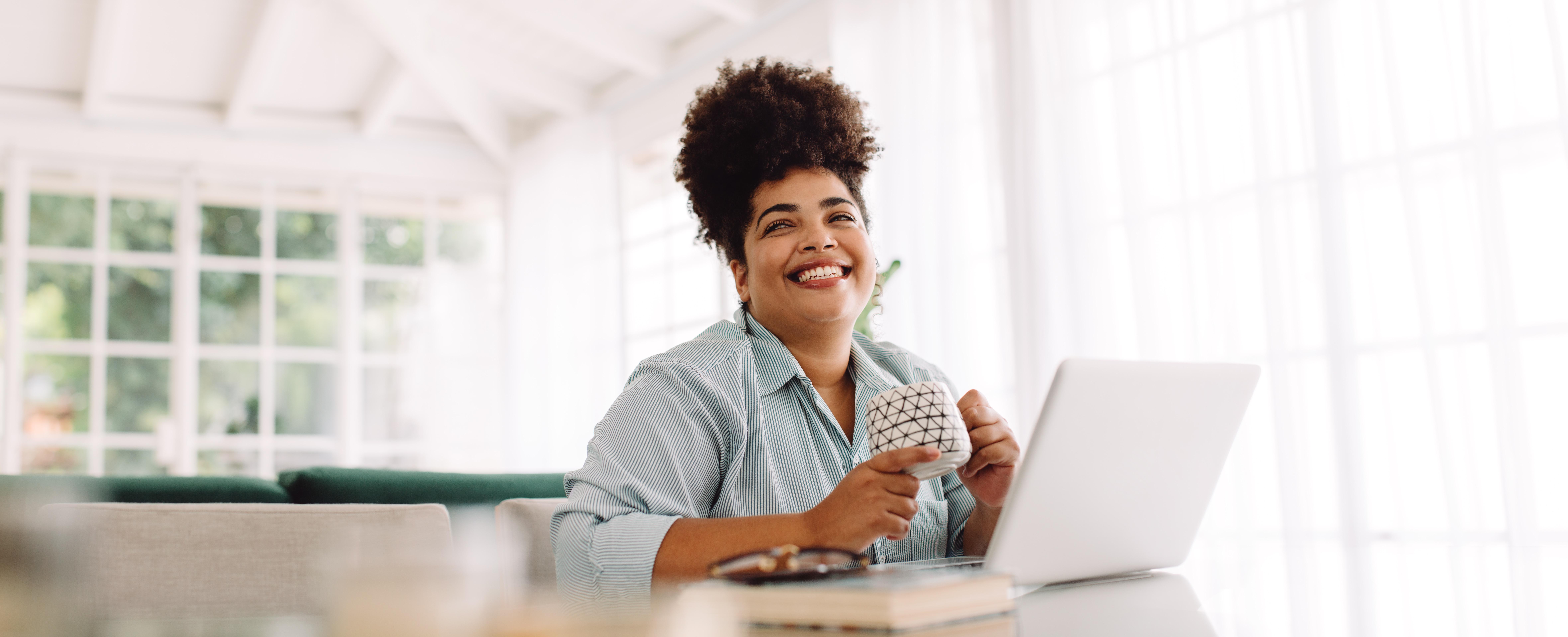 Woman on laptop stock image