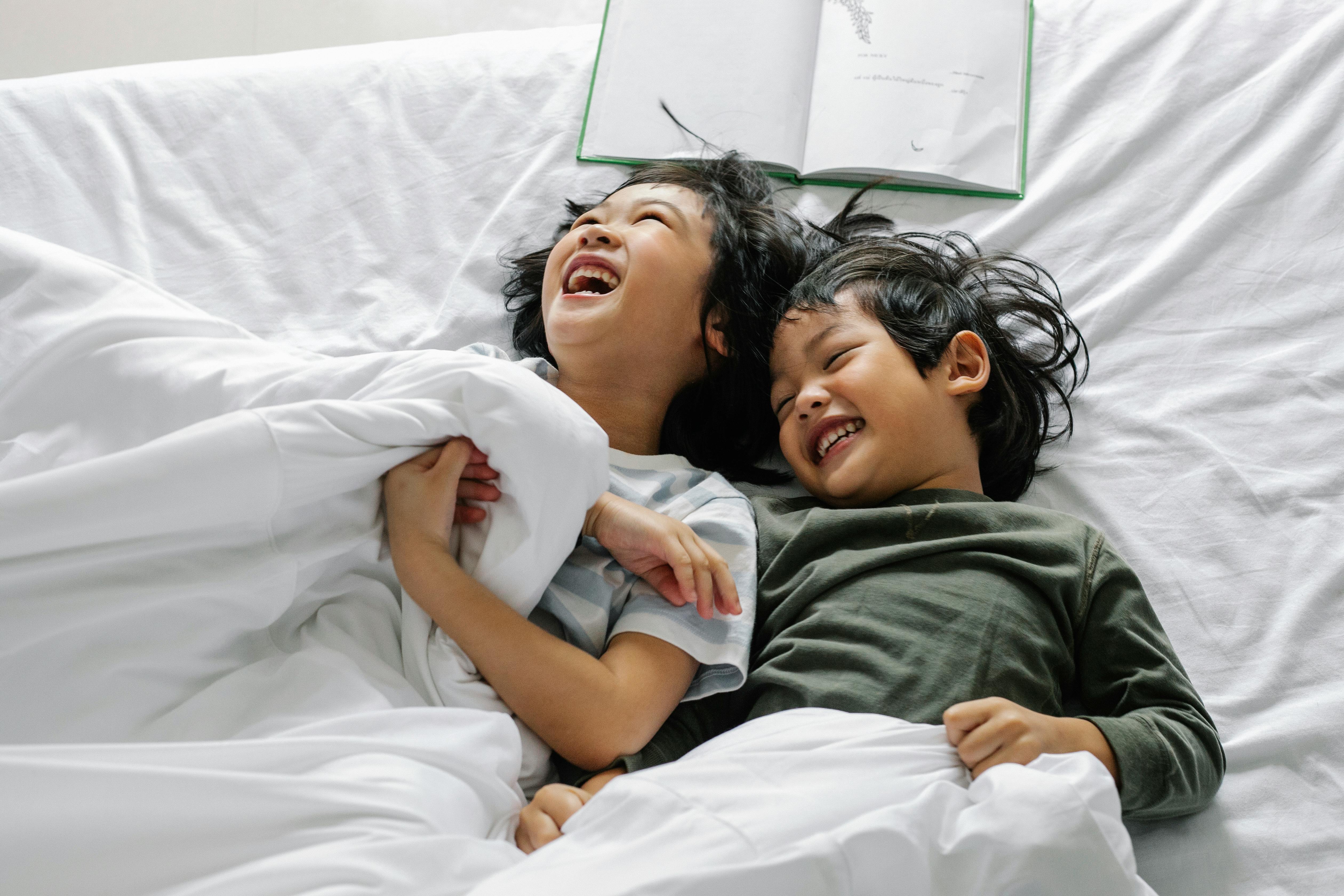 Kids in bed stock image
