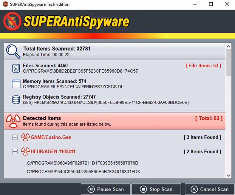 SUPERAntiSpyware scan results showing 32,781 total items scanned, 63 detected threats including GAME/Casino.Gen and HEUR/AGEN.1105411, with options to pause, stop, or cancel the scan.