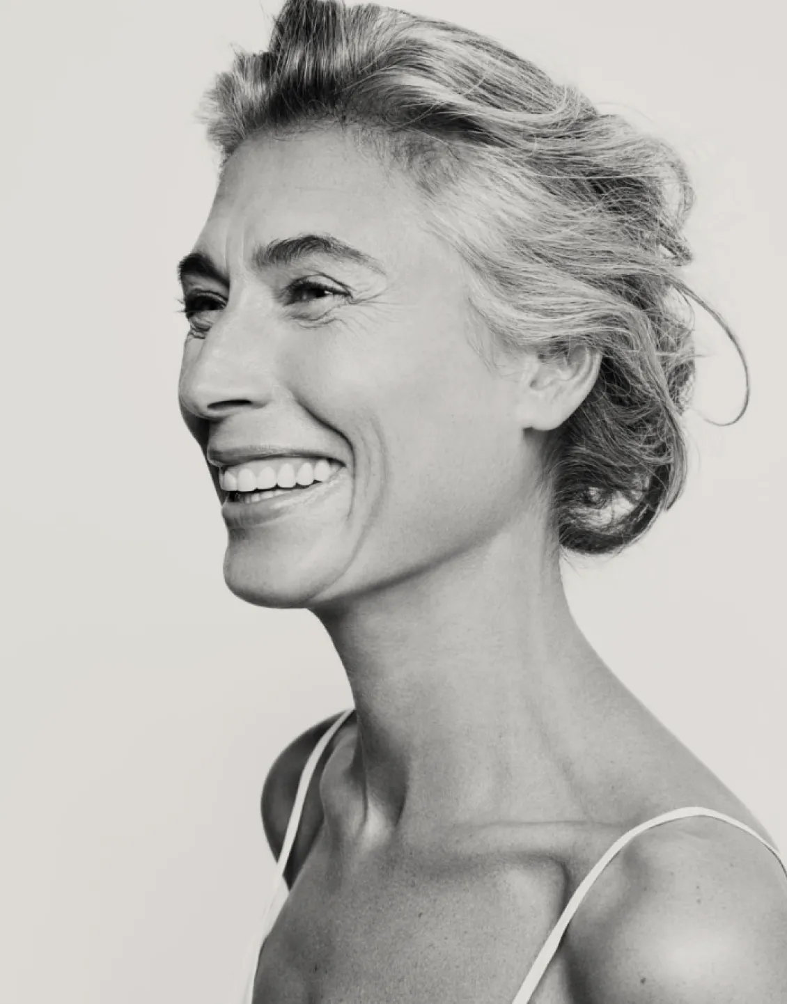 smiling woman with black overlay