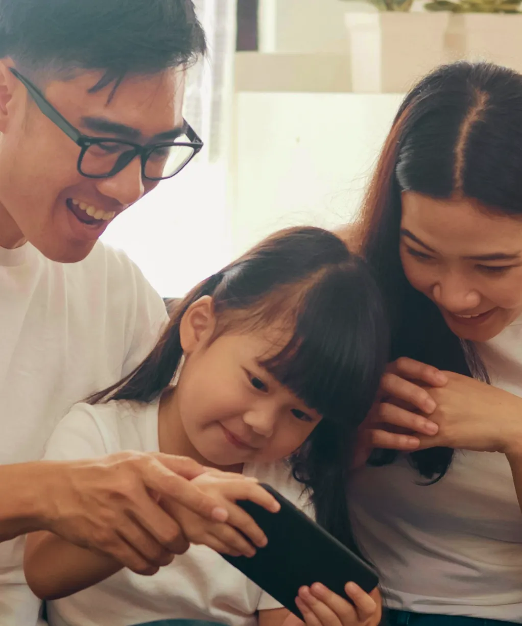 family playing mobile games