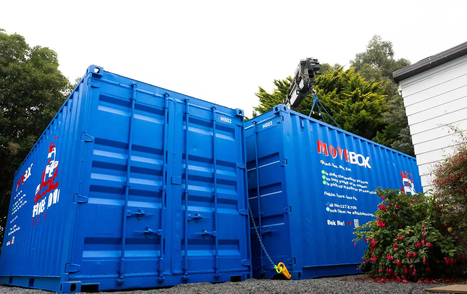 Blue StorePoint containers positioned at a Christchurch property