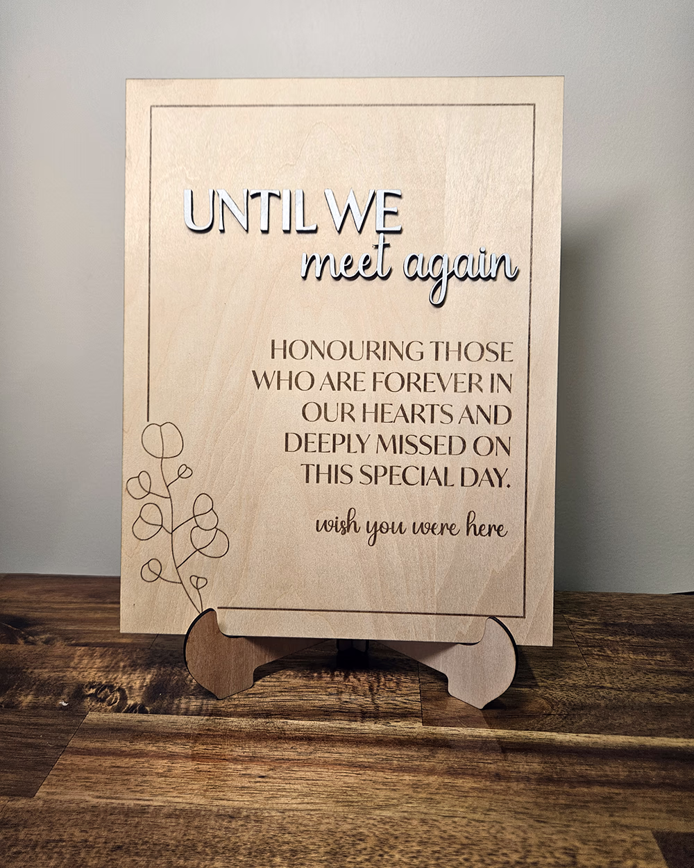 Engraved timber memorial wedding sign reading Until we meet again, displayed on a timber easel
