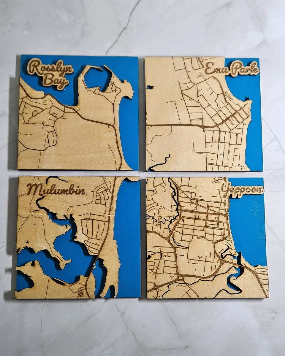 Four layered timber map artworks of Capricorn Coast localities