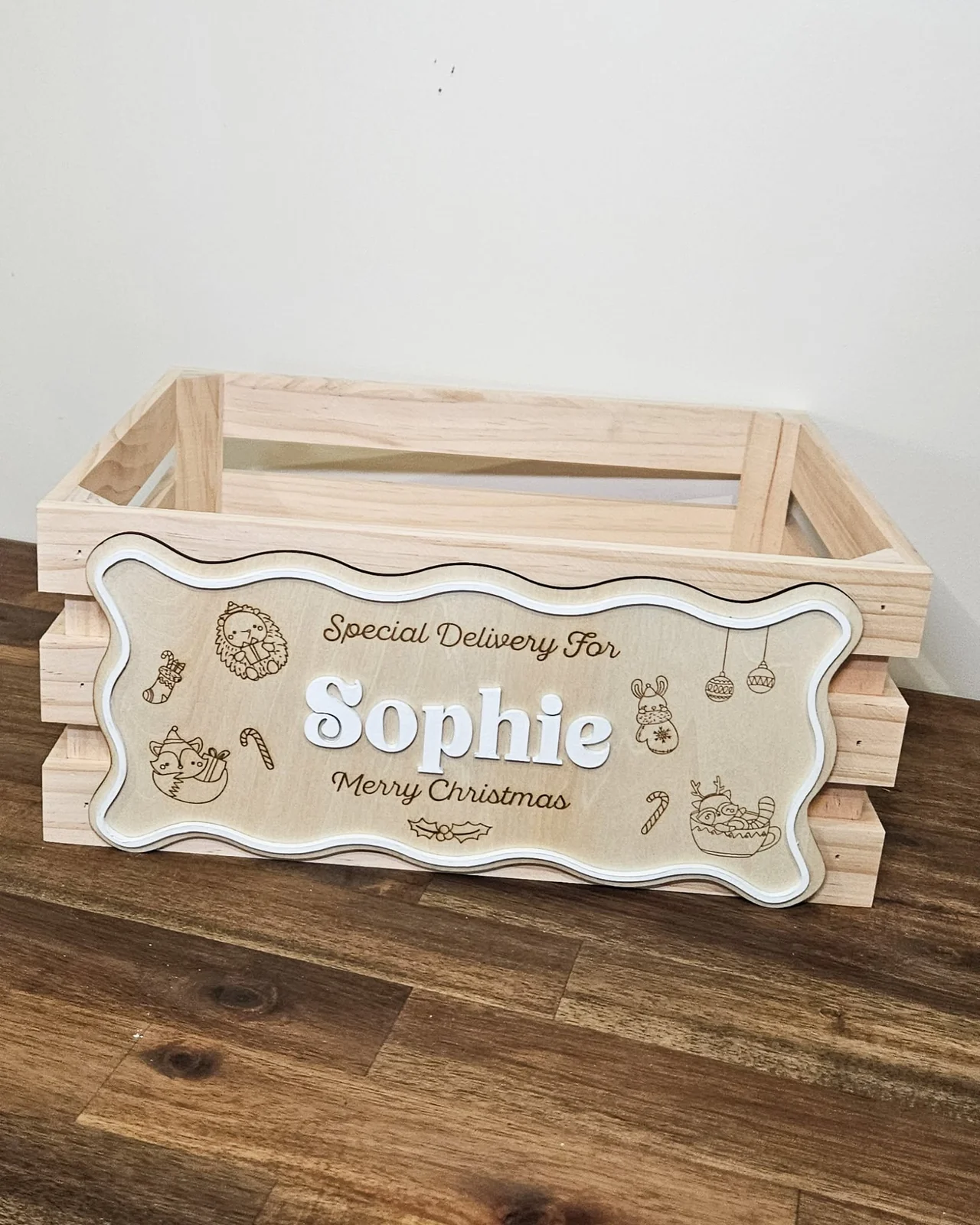 A timber Christmas Eve crate engraved Special Delivery for Sophie