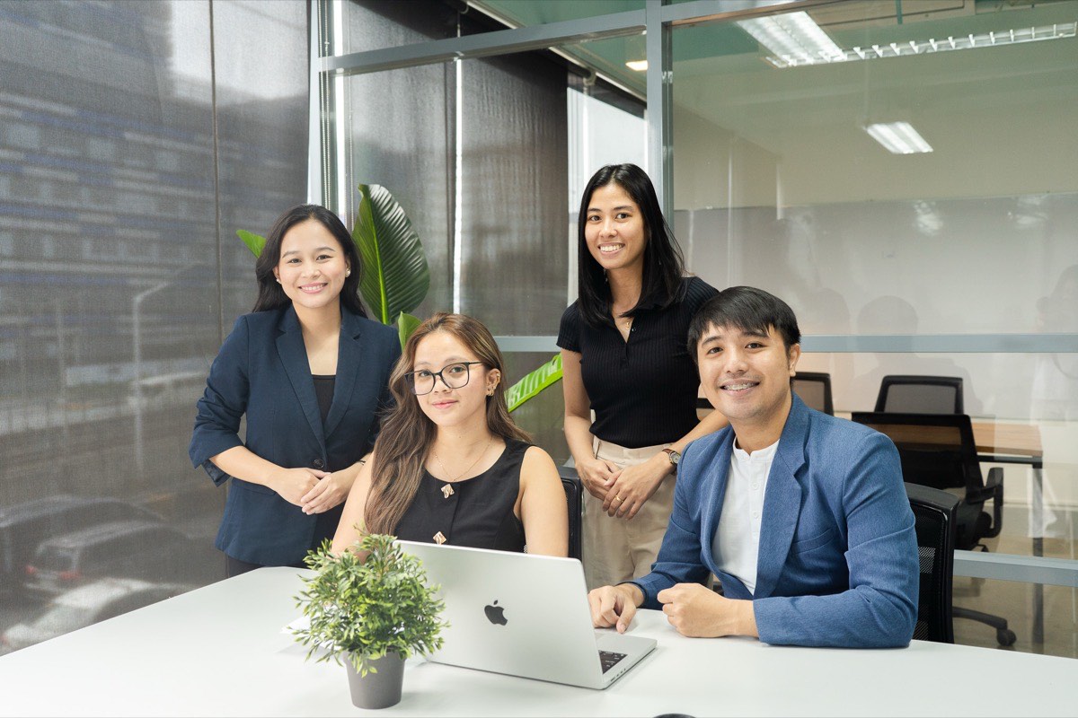 The CloudCFO team around a desk