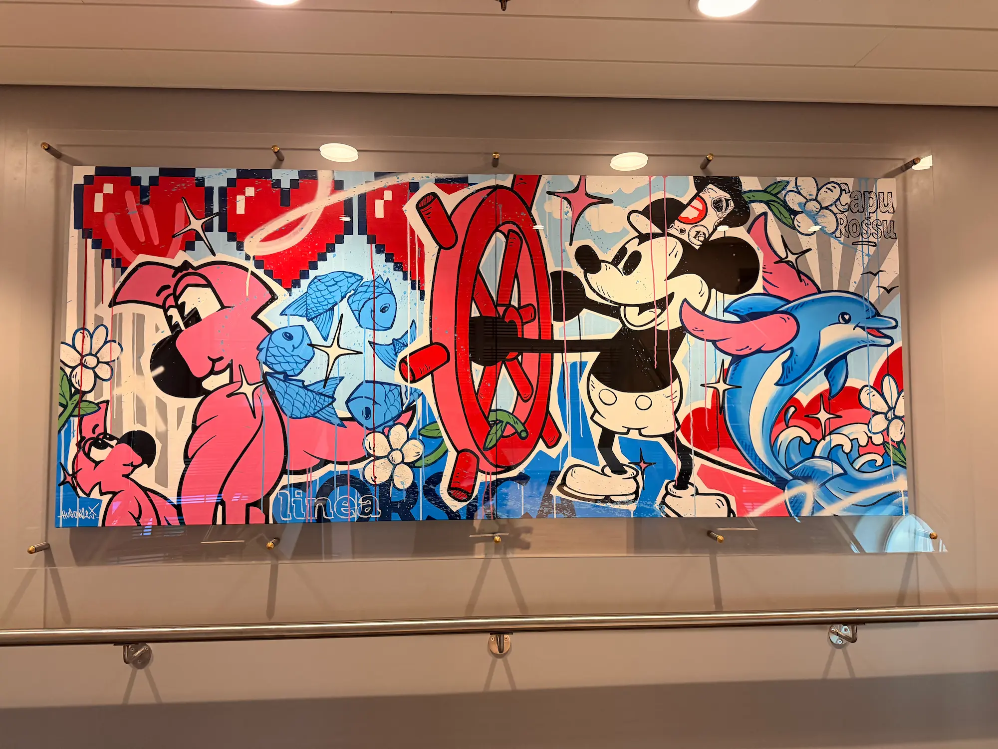 La toile de Hugo W2CJ en entier : Roger le Flamant Rose, des poissons, une barre de navire, Mickey et un dauphin, sous des cœurs rouges en pixels