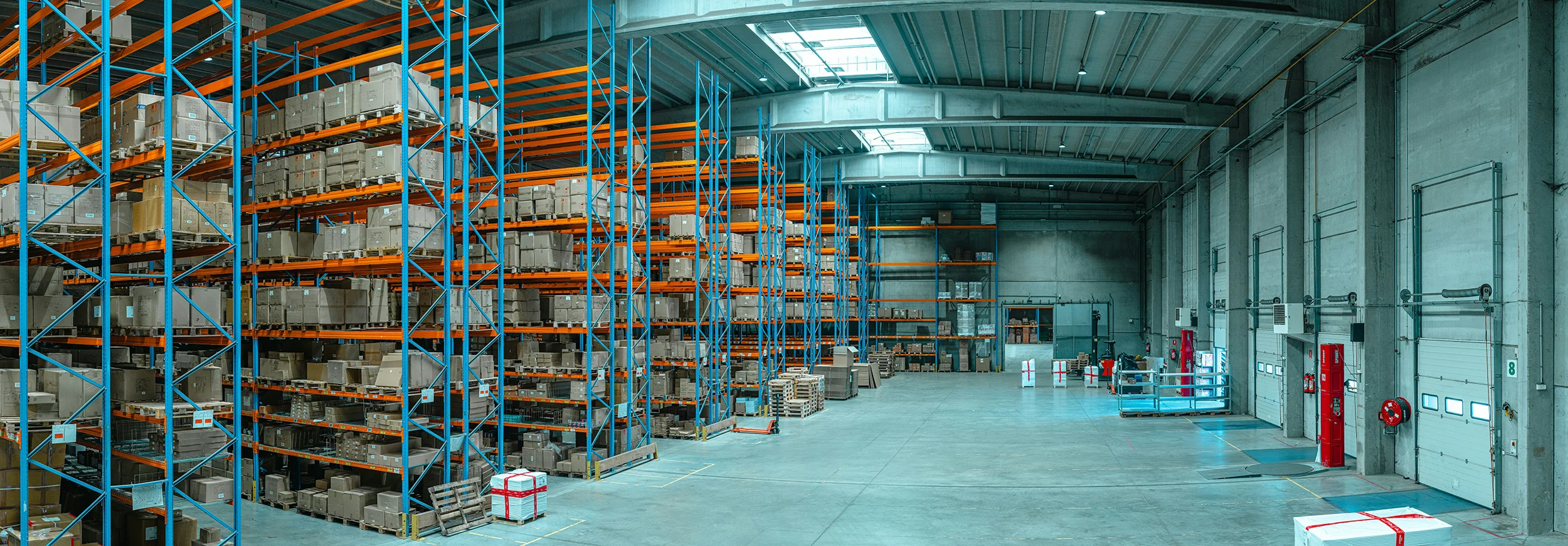 Warehouse with organized inventory stored on industrial racks