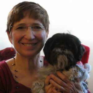 Acton Critter Sitters pet sitter with an animal in their care