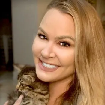Jill D., Time To Pet customer, holding her cat