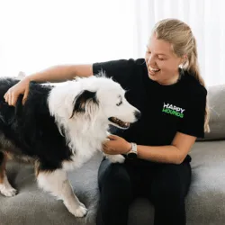 Nat D., Time To Pet customer, with a dog