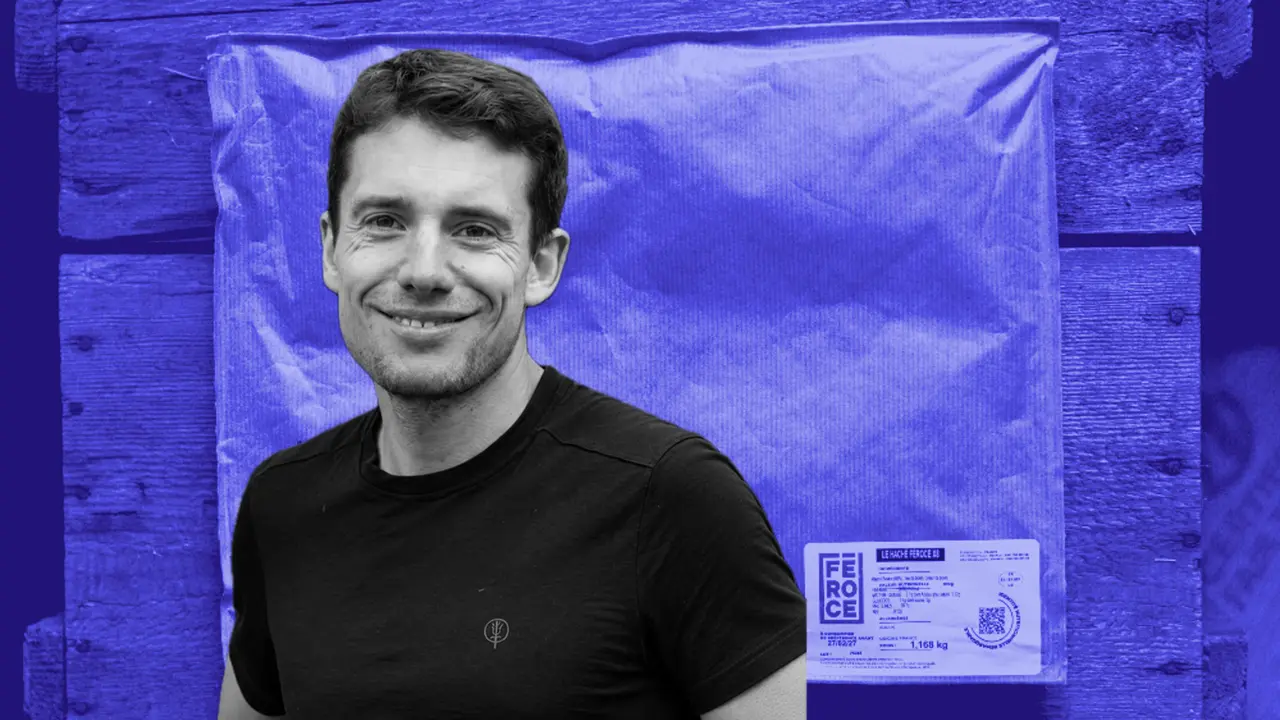 Féroce team member beside a pallet of wrapped product carrying a Féroce batch label.