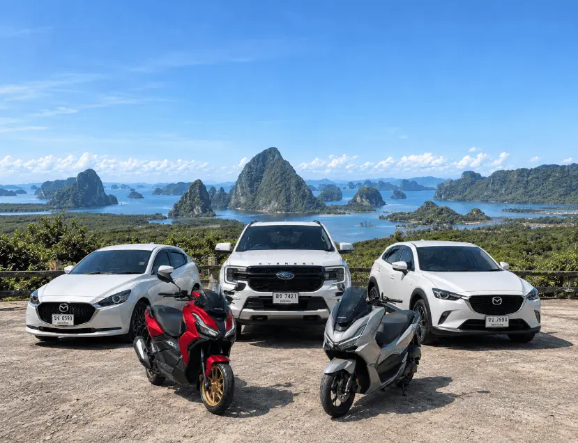 Farang Rental cars and bikes at a viewpoint