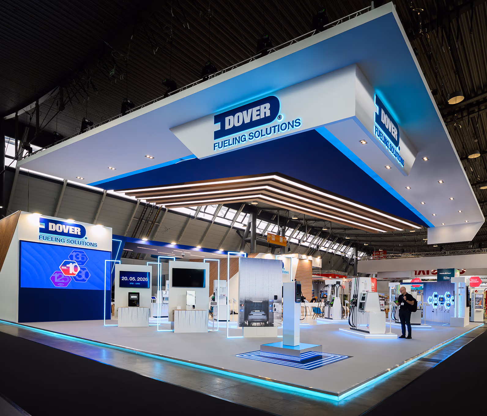 Trade show booth with KnowBe4 branding and seating areas for attack simulation and training.
