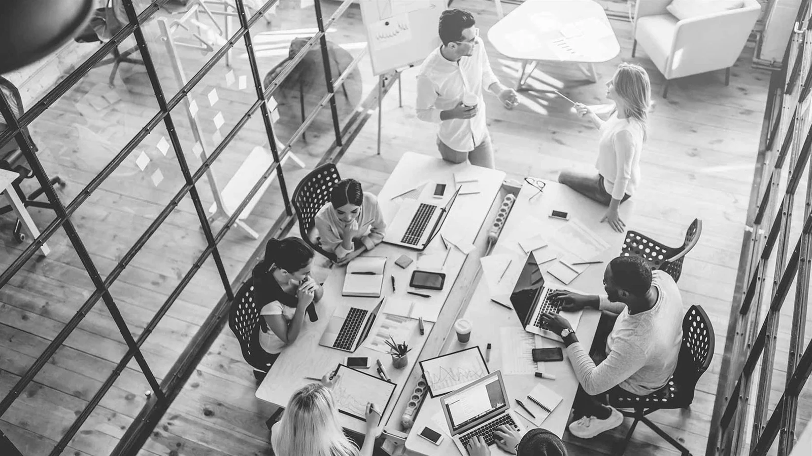 Open-plan workplace interior designed by Design Partnership for a corporate office fit-out.