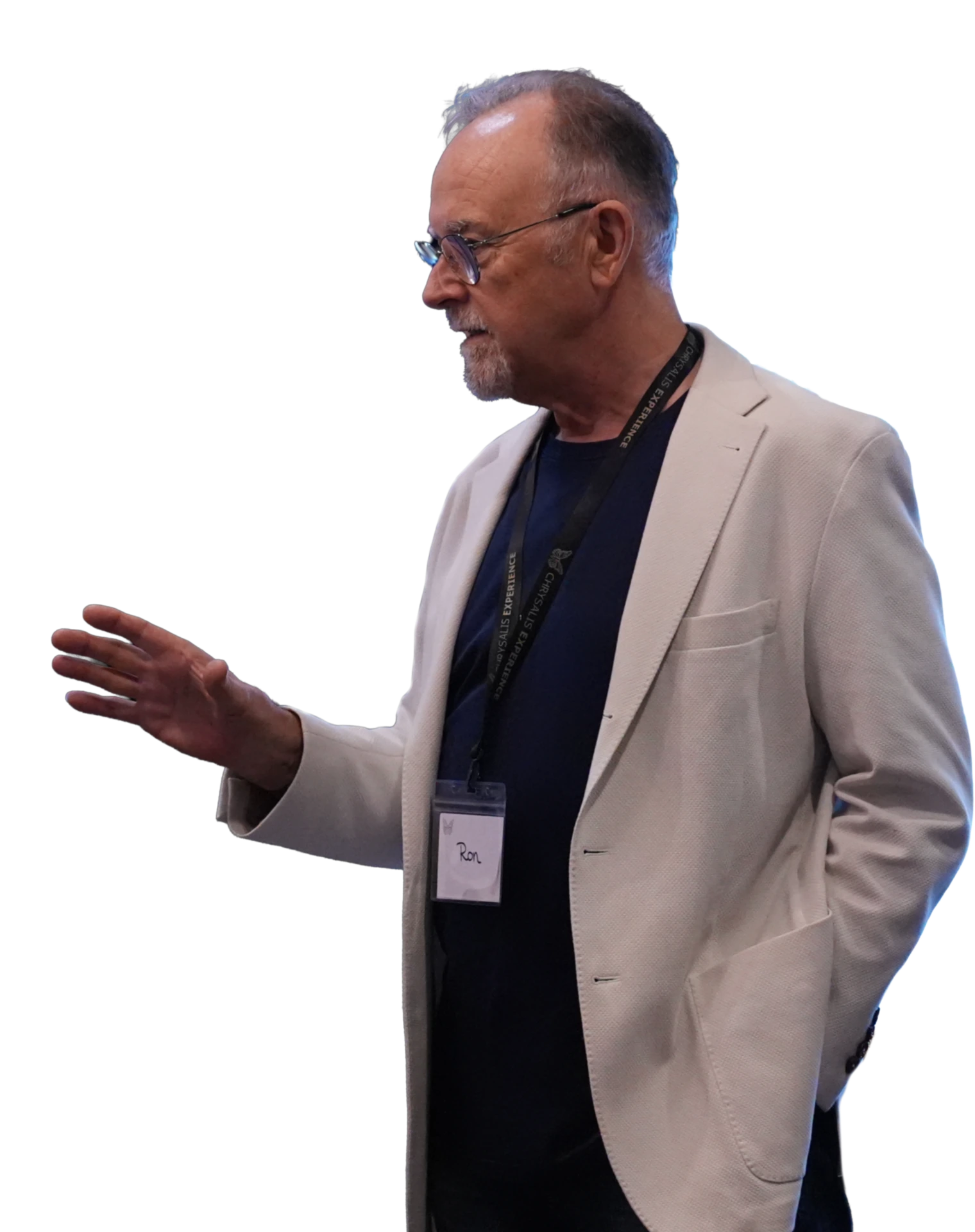Ron J West speaking, one hand extended mid-gesture