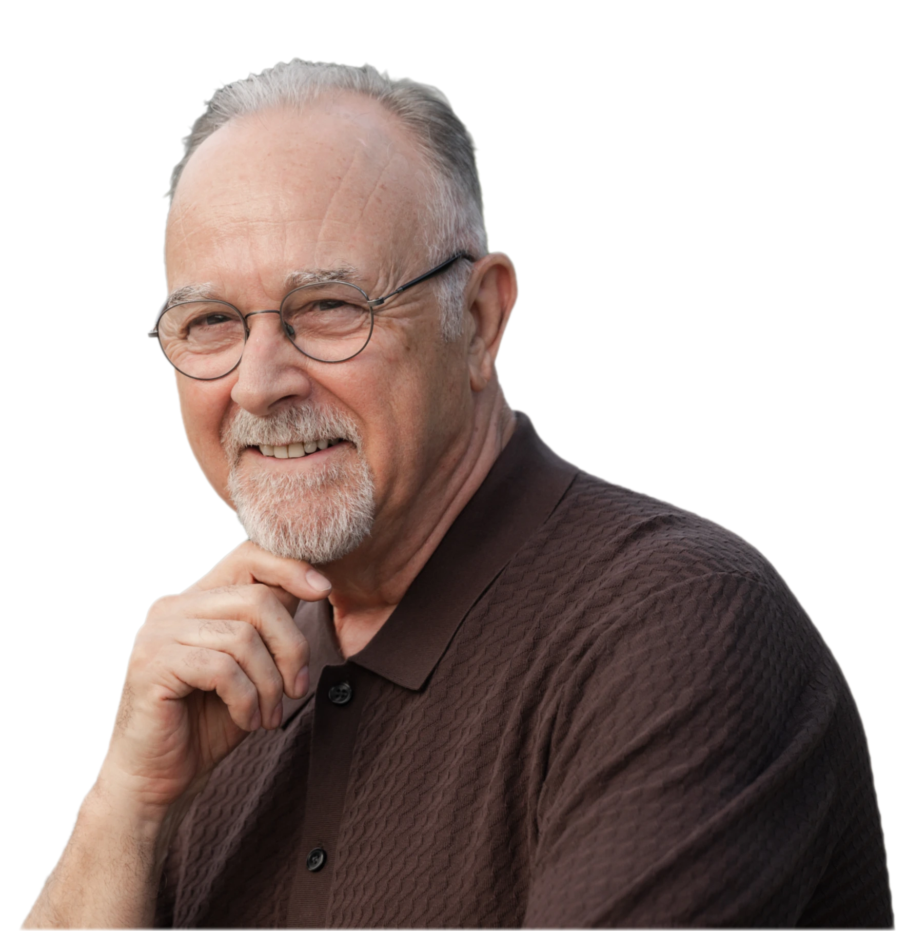 Ron J West smiling, hand resting under his chin