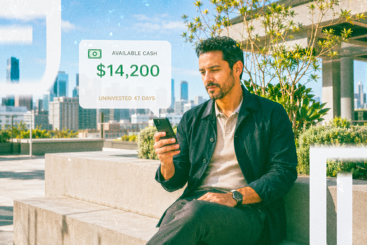 Person outdoors checking a phone with an idle-cash measurement overlay.