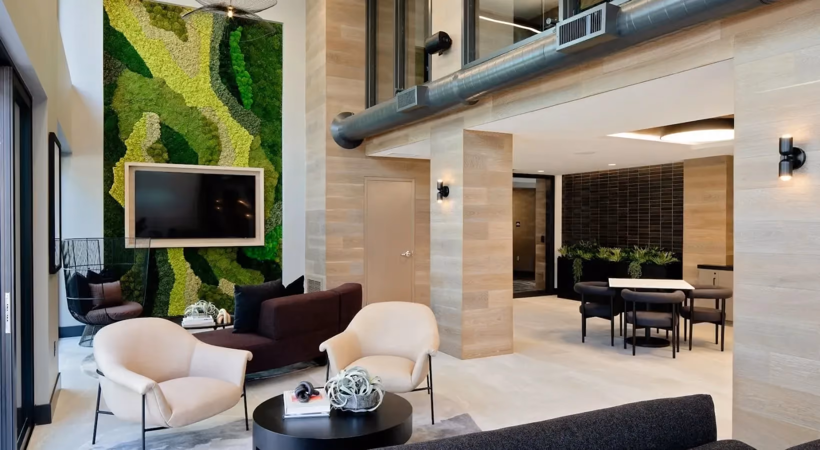 Community lounge lobby with mounted TV