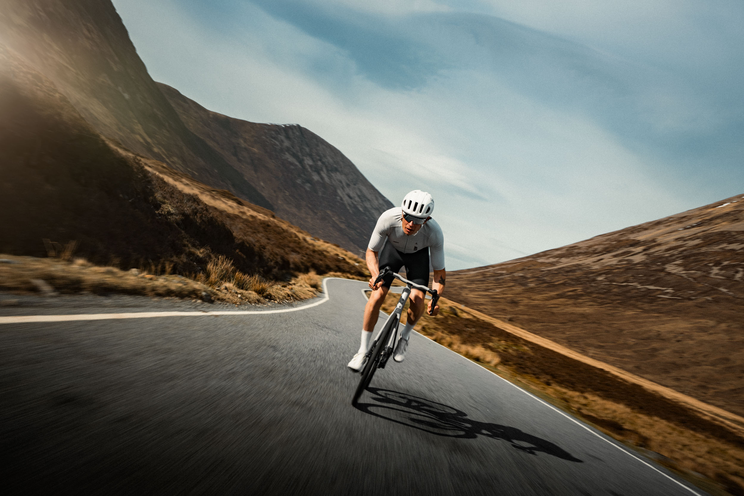 A rider on the Stelvio climb in early morning light