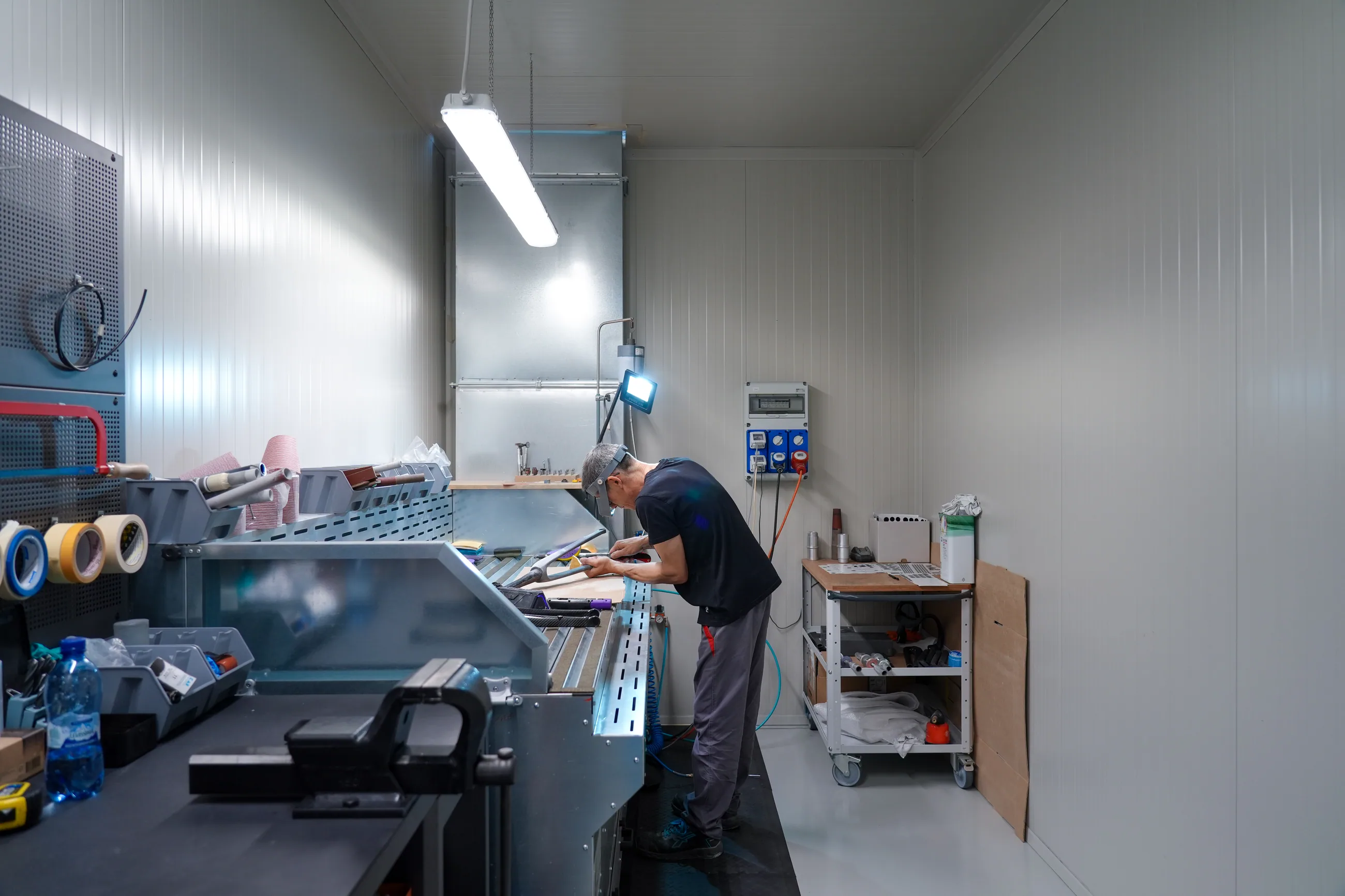 Carbon plies being cut at the workshop cutting table