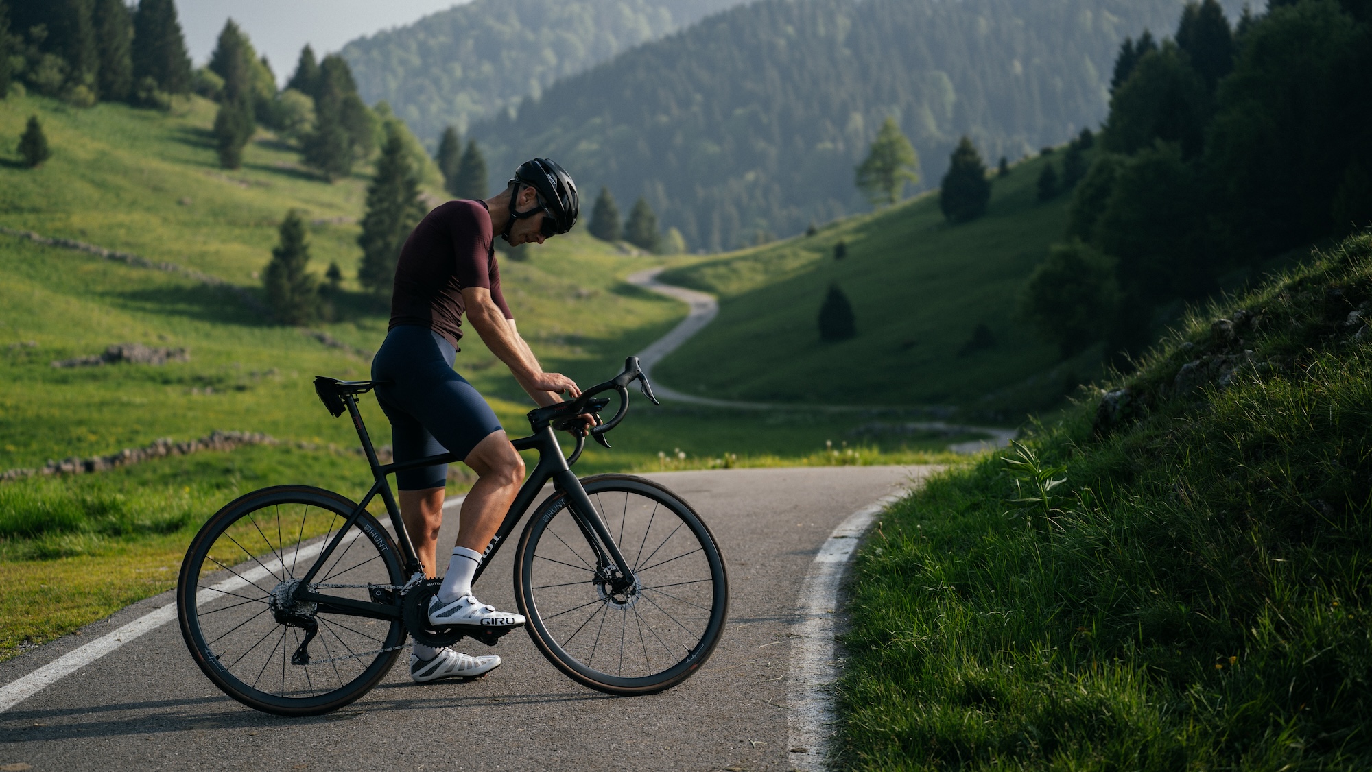 A rider on a SWI on a quiet green road in the hills above Bassano del Grappa