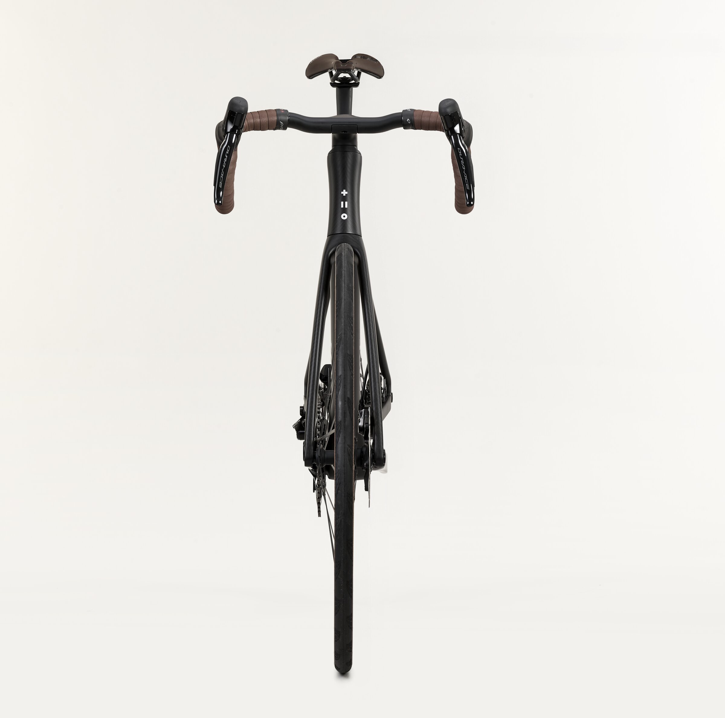 SWI Aequus from the front in a matt finish, built with tan bar tape and a brown saddle