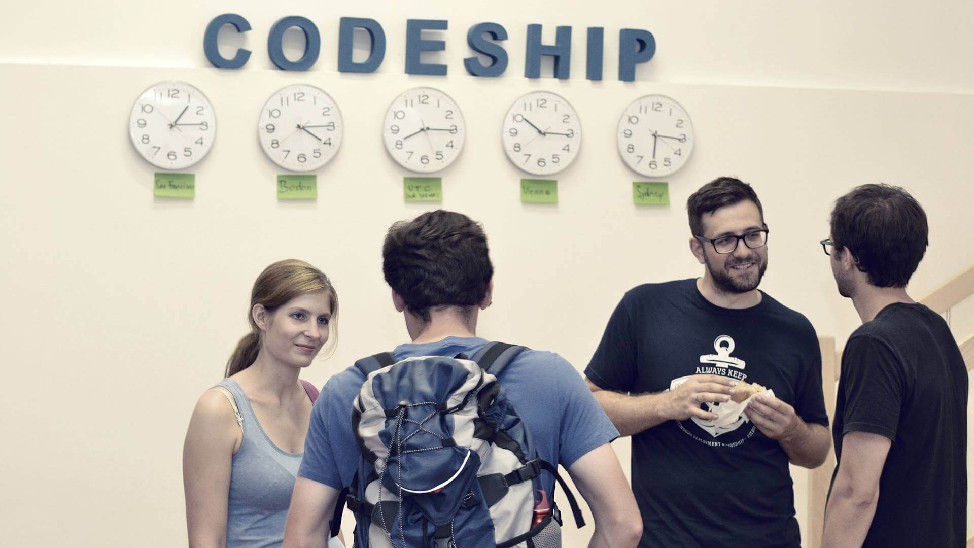 Clocks on the wall of the Codeship office