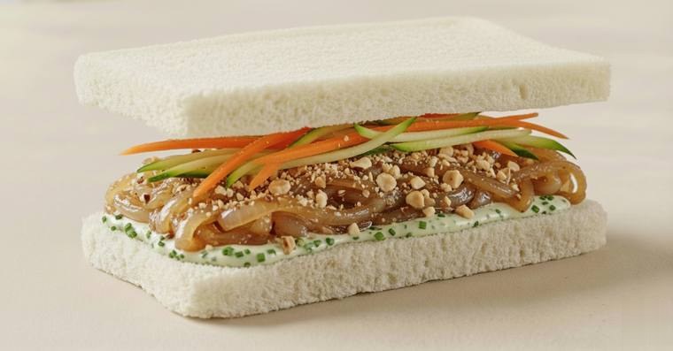 Crunchy Veggies finger sandwich with caramelised onions and hazelnuts