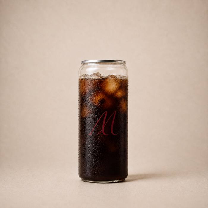 Iced Americano in a Maison Amie can
