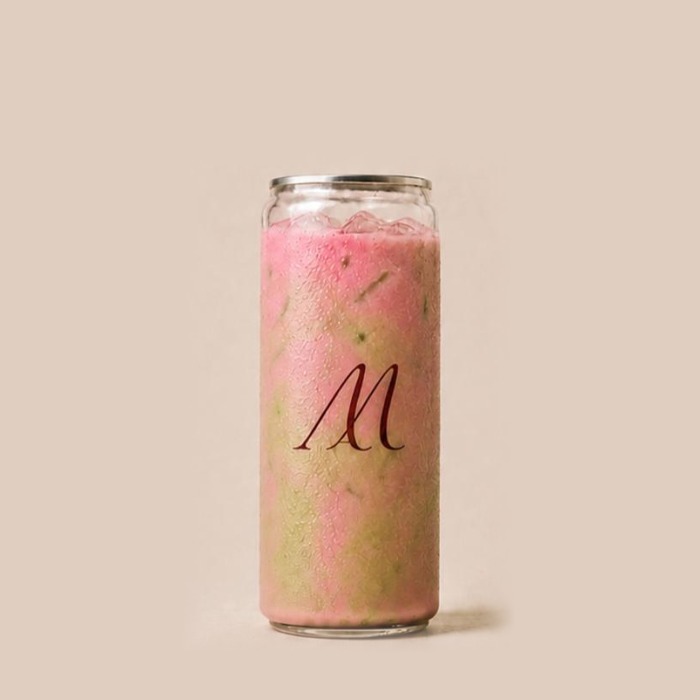 Pistachio and raspberry iced matcha in a Maison Amie can