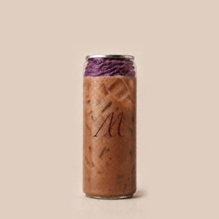 Special Iced Chocolate with peanut butter and blackberry whipped cream in a Maison Amie can