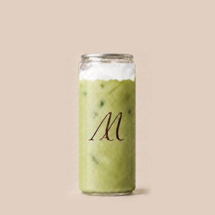 Matcha Nuage, iced matcha topped with a creamy cloud foam, in a Maison Amie can