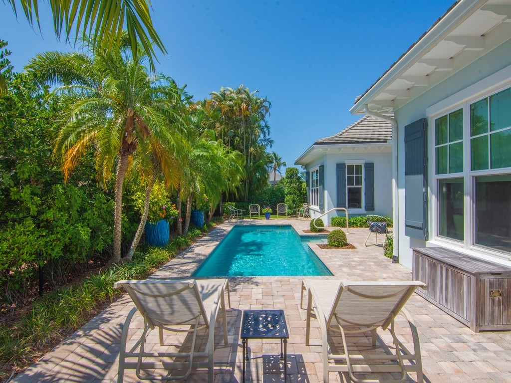 Lush Landscaping Surrounding Pool