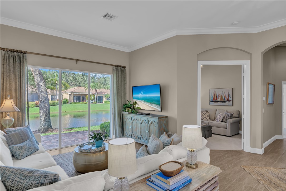 LIVING ROOM VIEW TO LAKE AND DEN