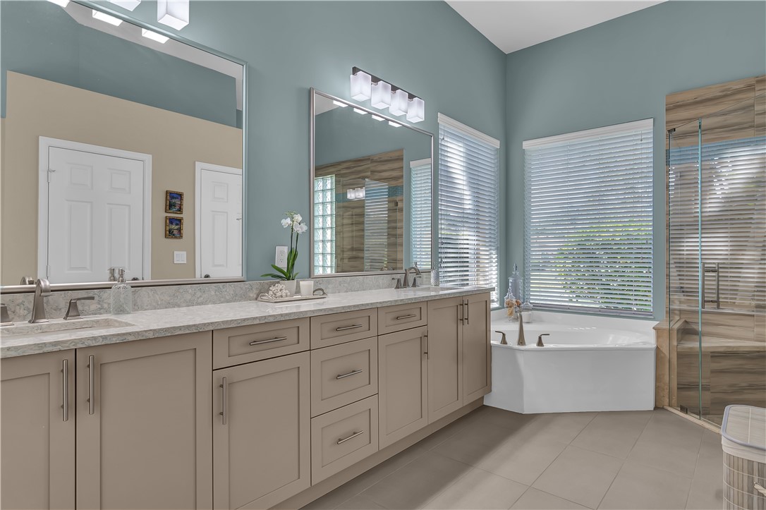 REMODELED OWNERS BATH WITH TUB AND SEPARATE SHOWER