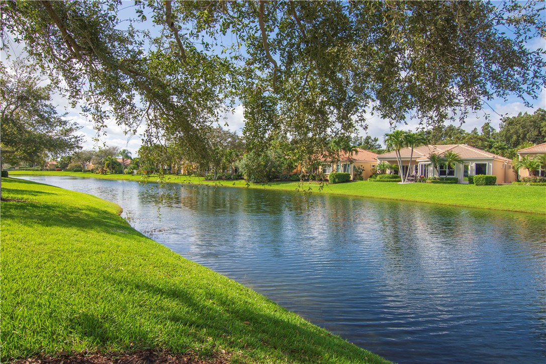 SHADED LAKE VIEW OFF REAR OF HOME