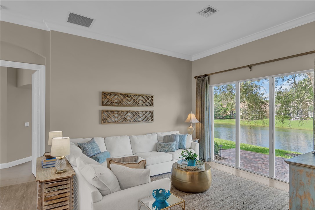 LIVING ROOM VIEW THRU SLIDERS TO LAKE
