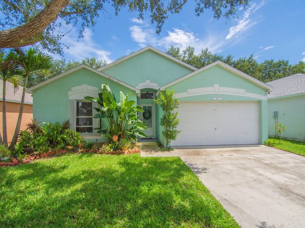 Light green exterior with white trim accents
