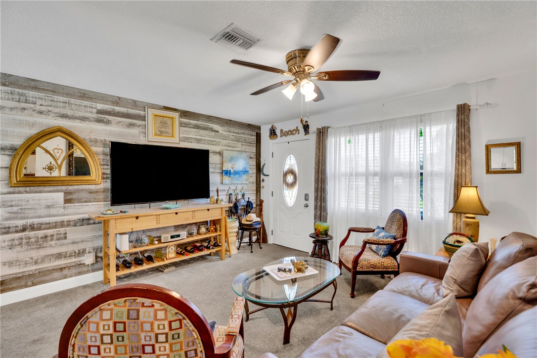 Living room with wood accent wall
