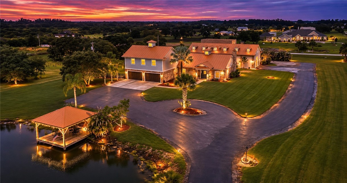 Circular driveway with extensive landscaping